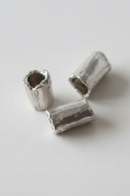 Colgante Bollo de plata: tres piezas tubulares abiertas